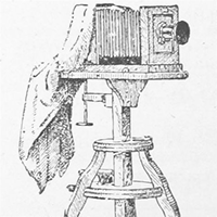 An illustration of a camera on top of a wooden stand with a dark cloth.